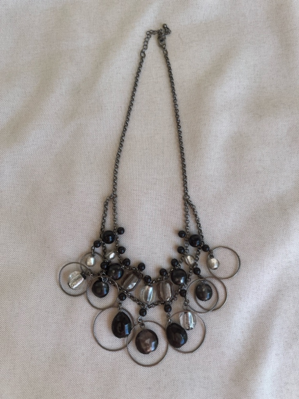 This is a vintage multi-strand beaded dangle necklace from Premier Designs.